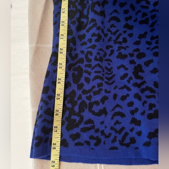 Spense Medium Midi Length knit Dress in a black and royal Blue print. - Picture 11 of 11